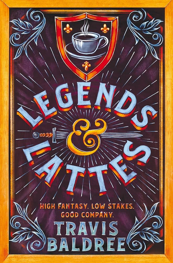 Australian cover of Legends and Lattes. The title is in the centre of the book with a sword running through the ampersand for 'and'. Above it is a shield with a coffee cup in its centre. The whole thing is designed to look like a coffeeshop chalk board. 